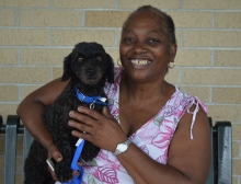 Ann Watson and her poodle Herschel sought shelter from the floods.