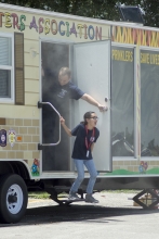 Carlinana Cox exits the smoke trailer at Fire Camp. photo by Jessica Coleman